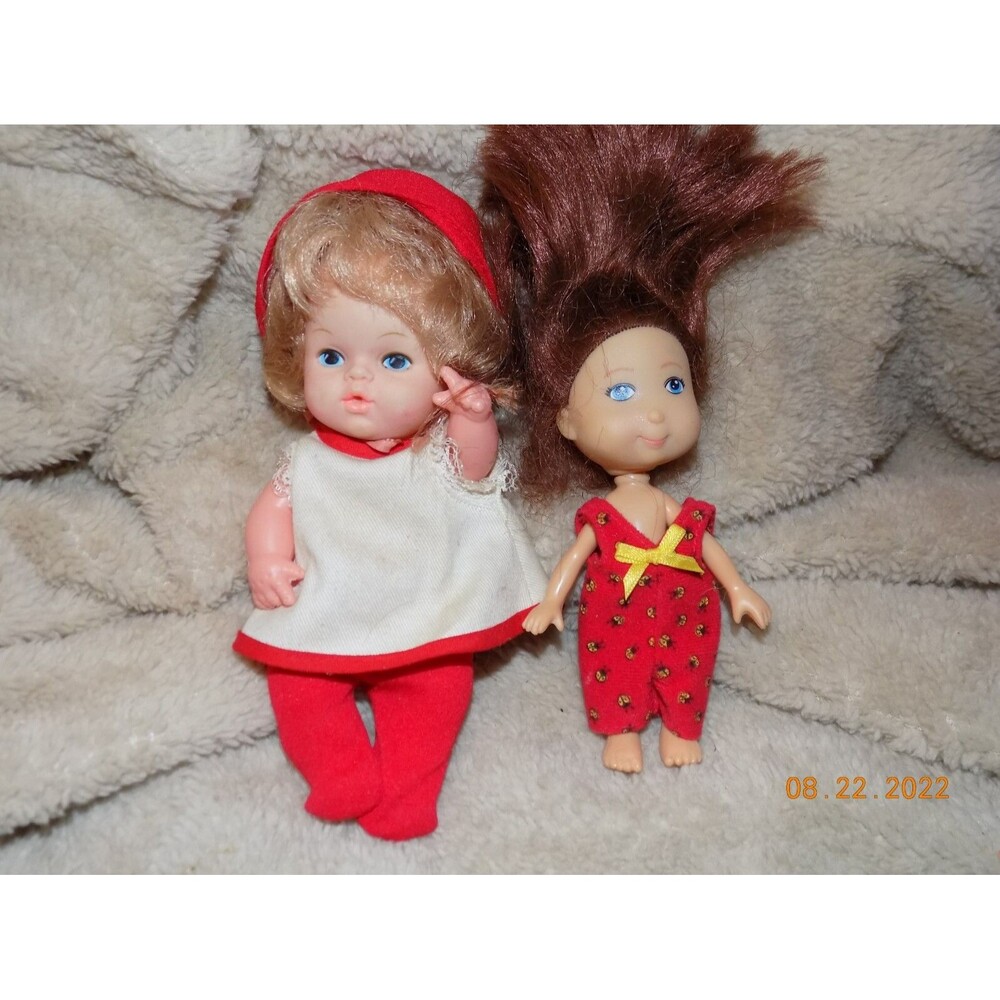 Pair of vintage small dolls